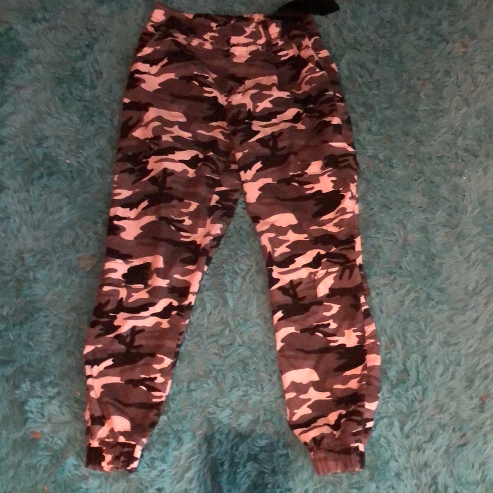 Black and white army pants, very lightly worn and in fantastic condition.
